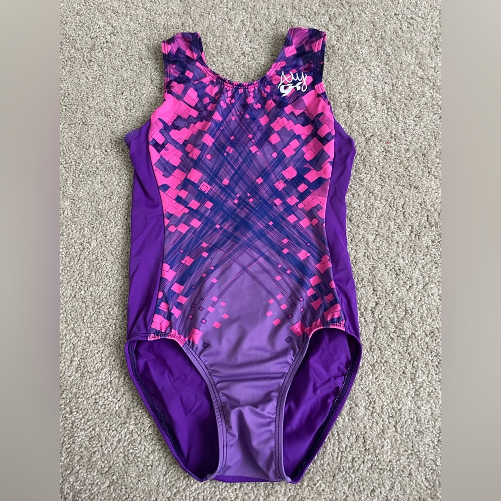 Gently used GK Ally Raisman leotard in size child large